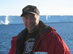 Jack DiTullio in front of iceberg